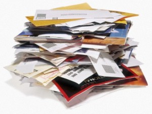 Pile of unwanted bills and junk mail to recycle